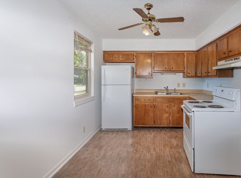 4357 Central Valley Drive Hermitage, TN 37076 - Photo 11 of 19 a kitchen with a stove a sink and a refrigerator