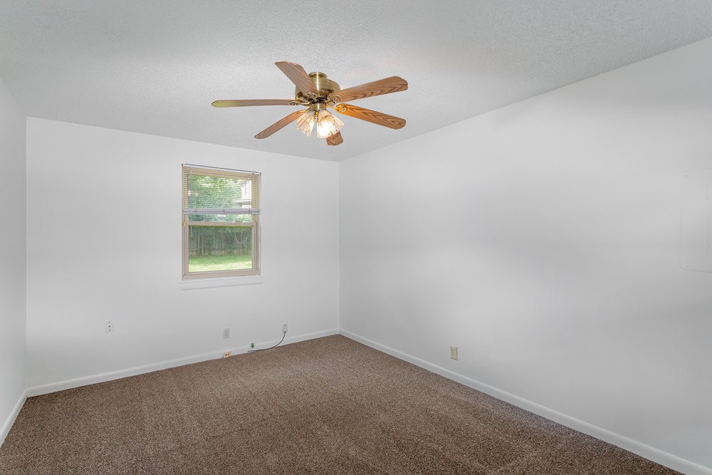 4357 Central Valley Drive Hermitage, TN 37076 - Photo 15 of 19 an empty room with windows and fan