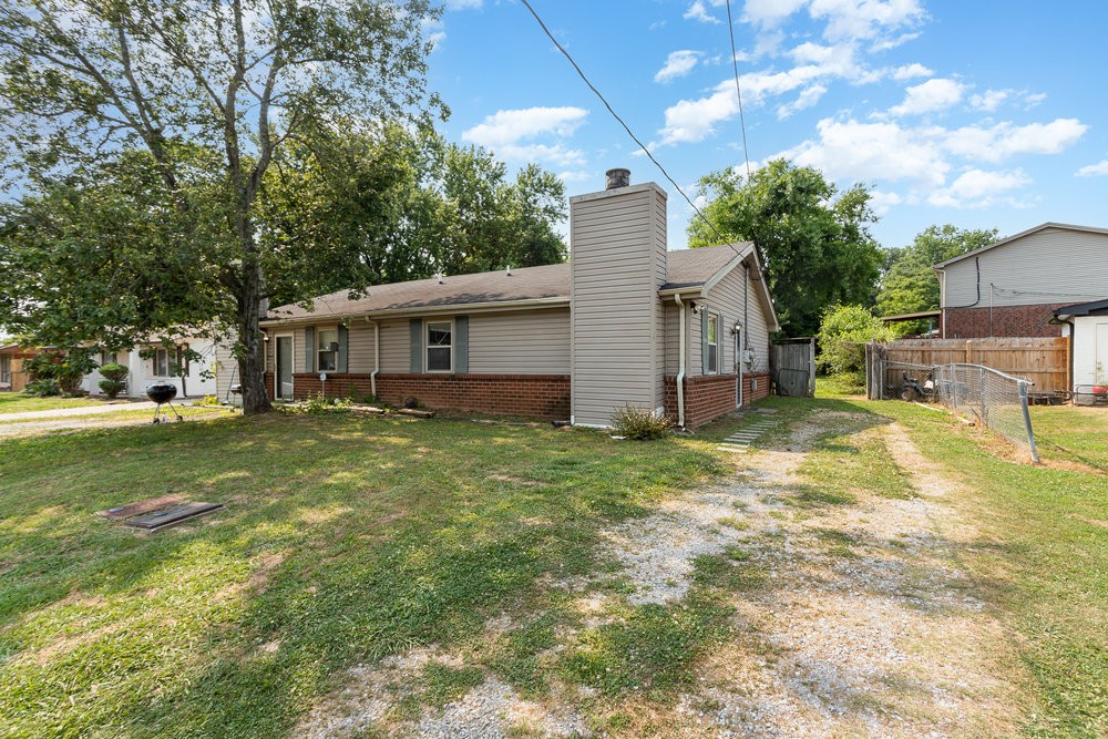 4357 Central Valley Drive Hermitage, TN 37076 - Photo 2 of 19 a view of a house with a backyard