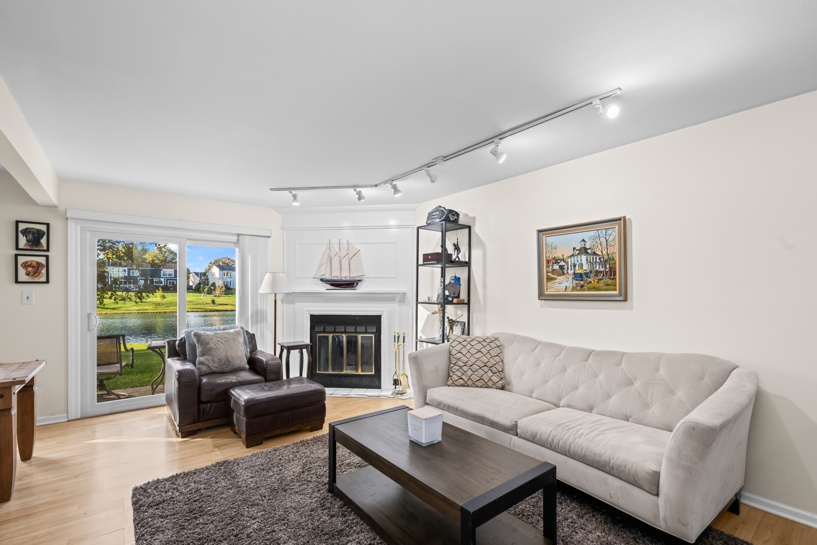 1376 Longacre Lane Wheeling, IL 60090 - Photo 4 of 16 a living room with furniture and a fireplace