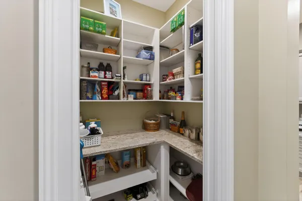 a view of workspace with cabinets