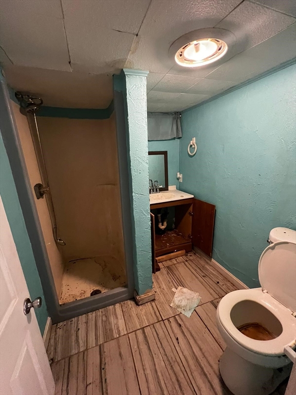16 Grist Mill Road Grafton, MA 01519 - Photo 14 of 16 a bathroom with a sink and a toilet