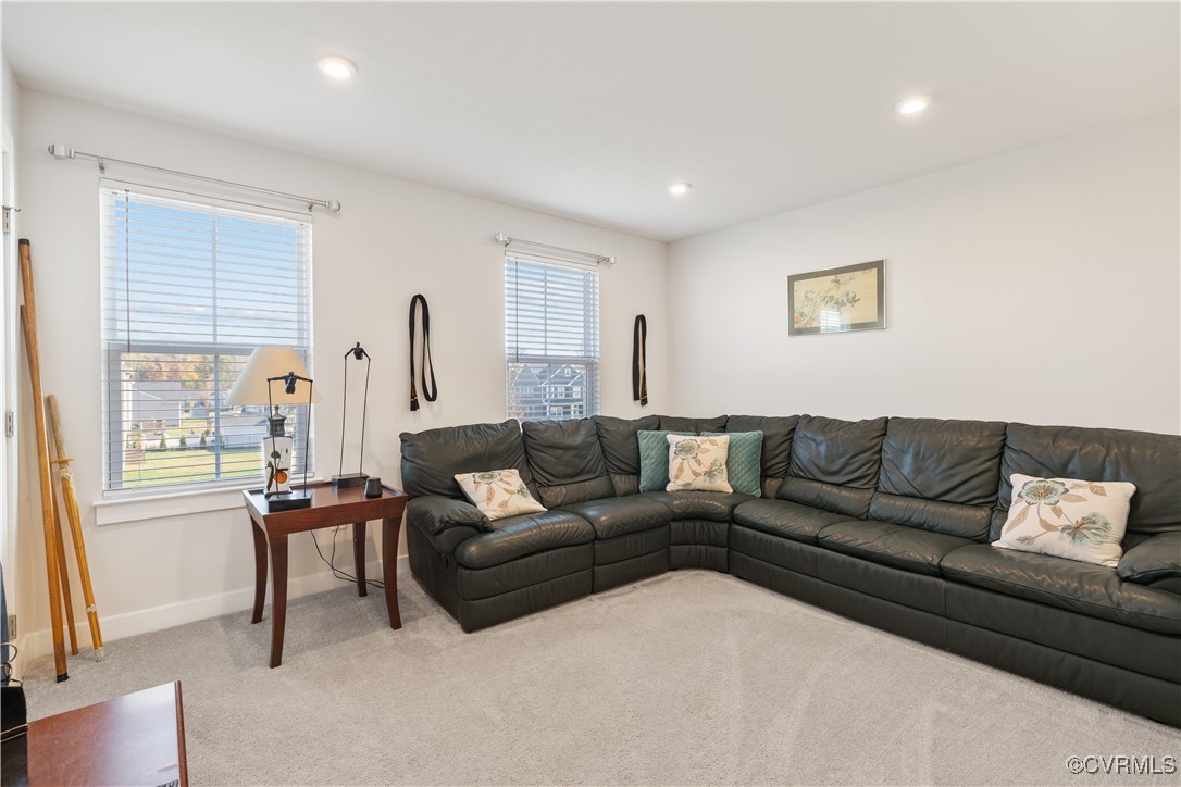 13901 Marsham Road Chester, VA 23836 - Photo 15 of 27 a living room with furniture and a large window