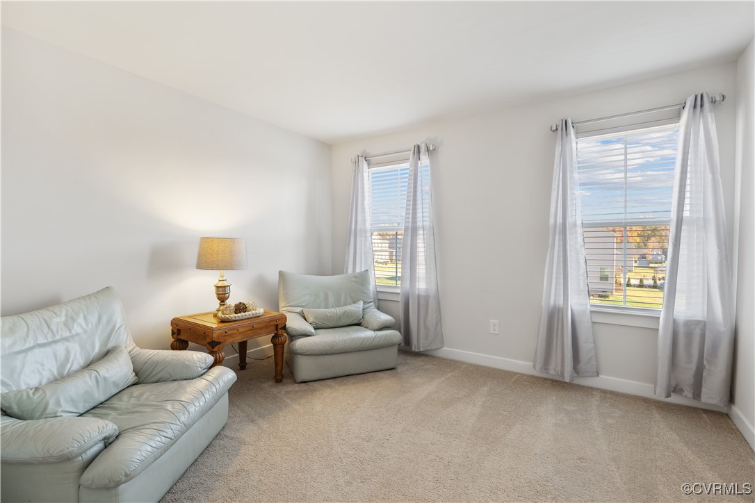 13901 Marsham Road Chester, VA 23836 - Photo 18 of 27 a living room with furniture and a window