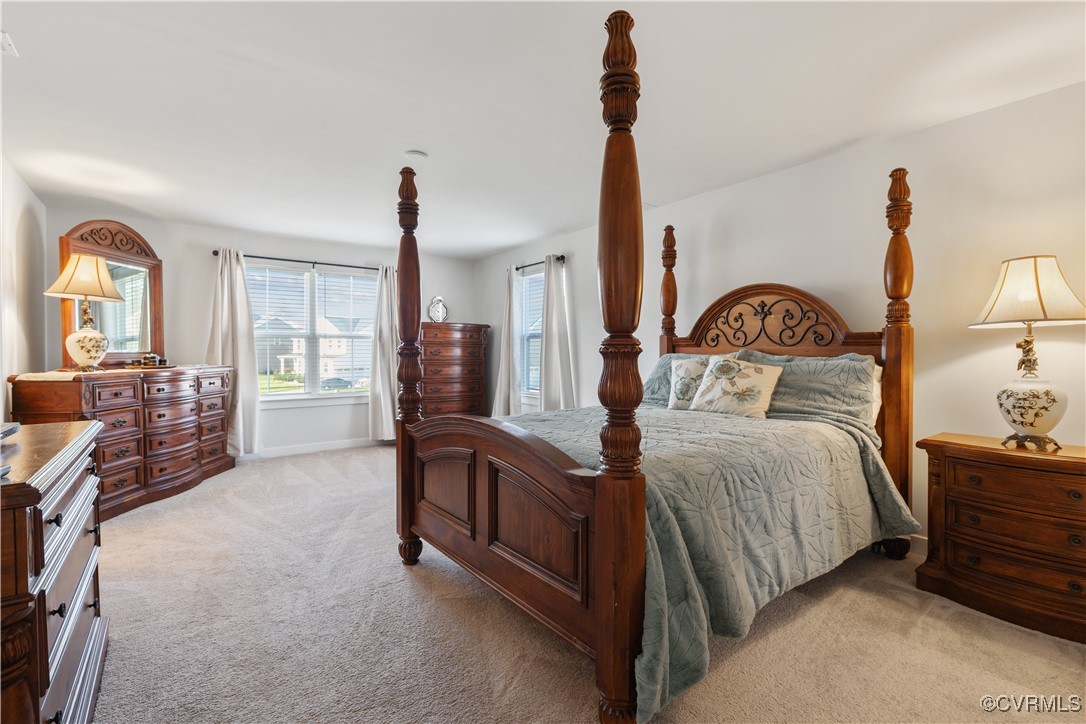 13901 Marsham Road Chester, VA 23836 - Photo 19 of 27 a bedroom with bed and window