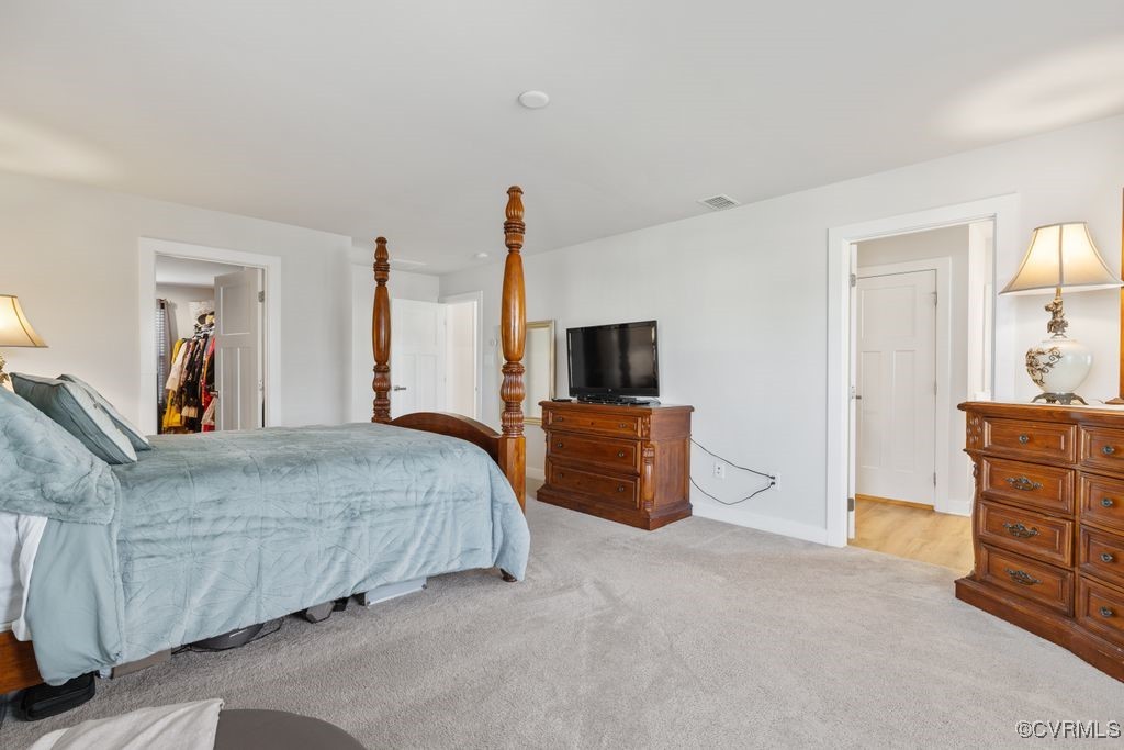 13901 Marsham Road Chester, VA 23836 - Photo 20 of 27 a living room with furniture and a flat screen tv