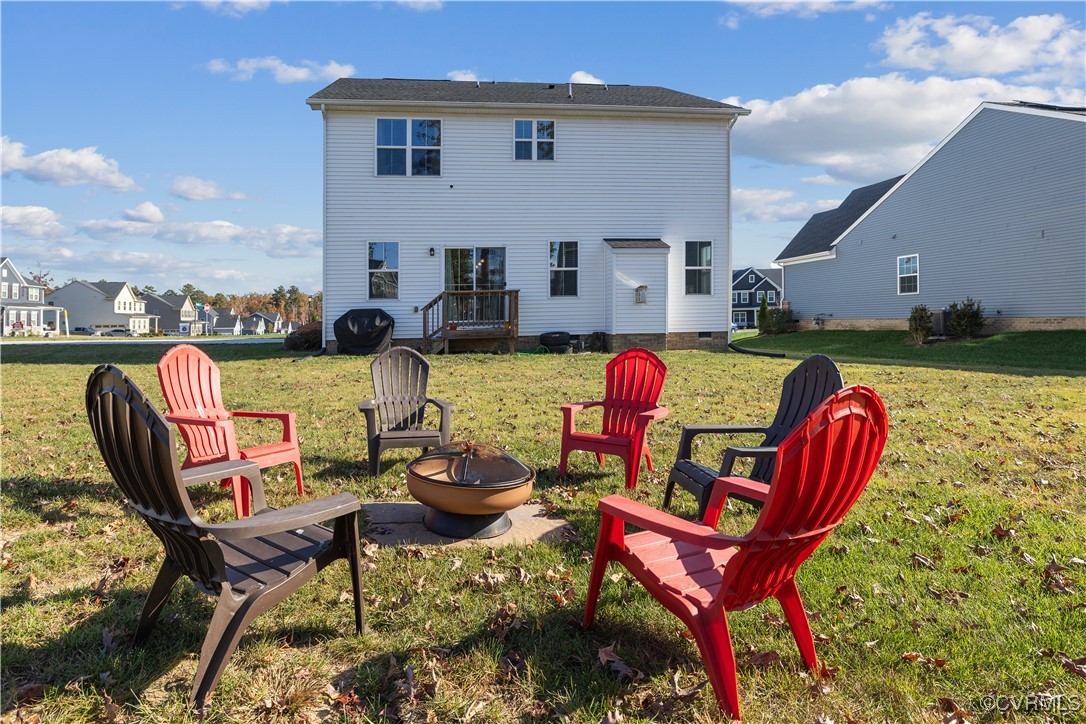 13901 Marsham Road Chester, VA 23836 - Photo 25 of 27 a patio with patio table and chairs