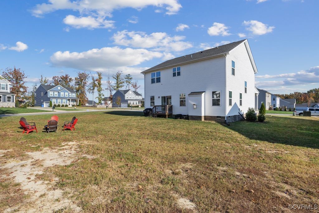 13901 Marsham Road Chester, VA 23836 - Photo 26 of 27 a view of a house with a big yard and large tree