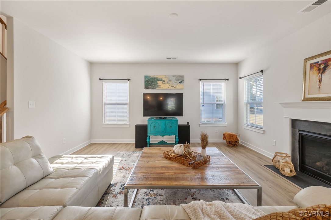13901 Marsham Road Chester, VA 23836 - Photo 5 of 27 a living room with furniture and a fireplace