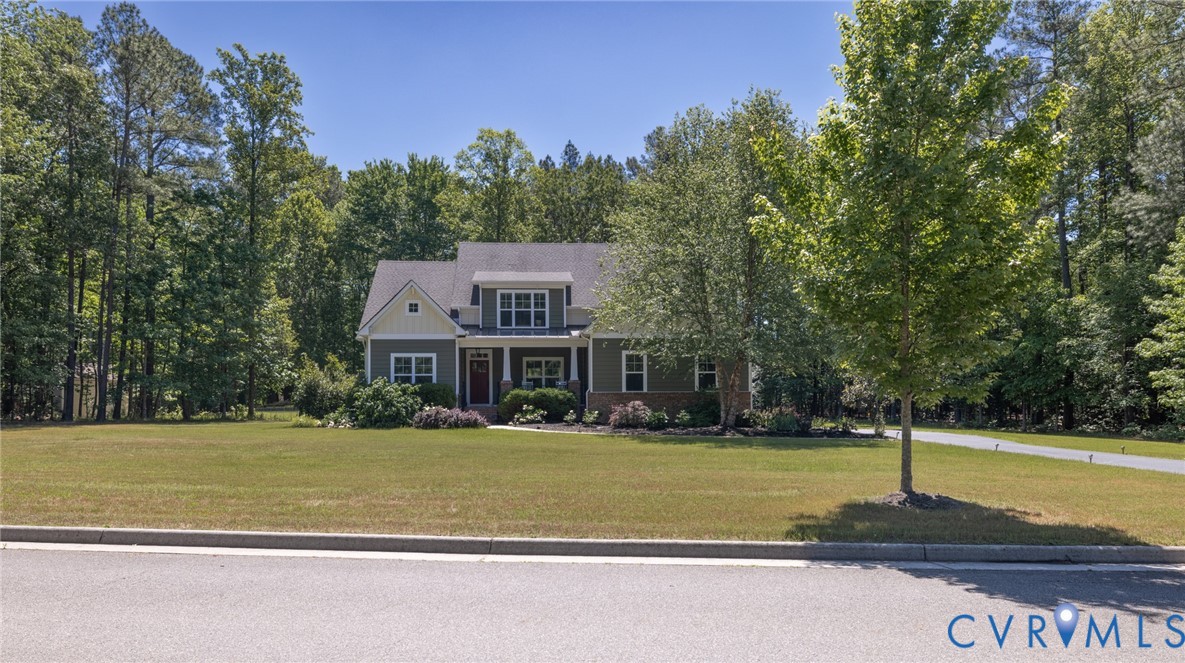 705 Wales Way Ashland, VA 23005 - Photo 3 of 62 a front view of a house with a yard