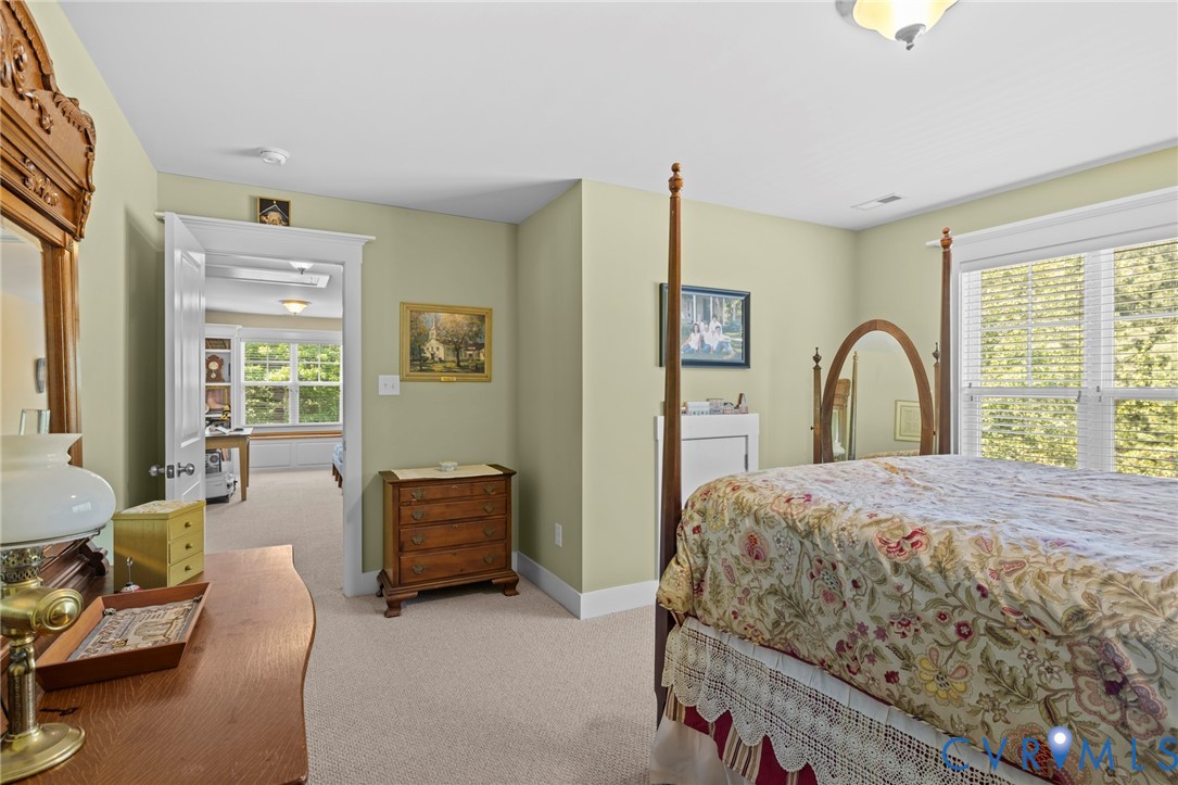 705 Wales Way Ashland, VA 23005 - Photo 33 of 62 a bedroom with a bed and a window