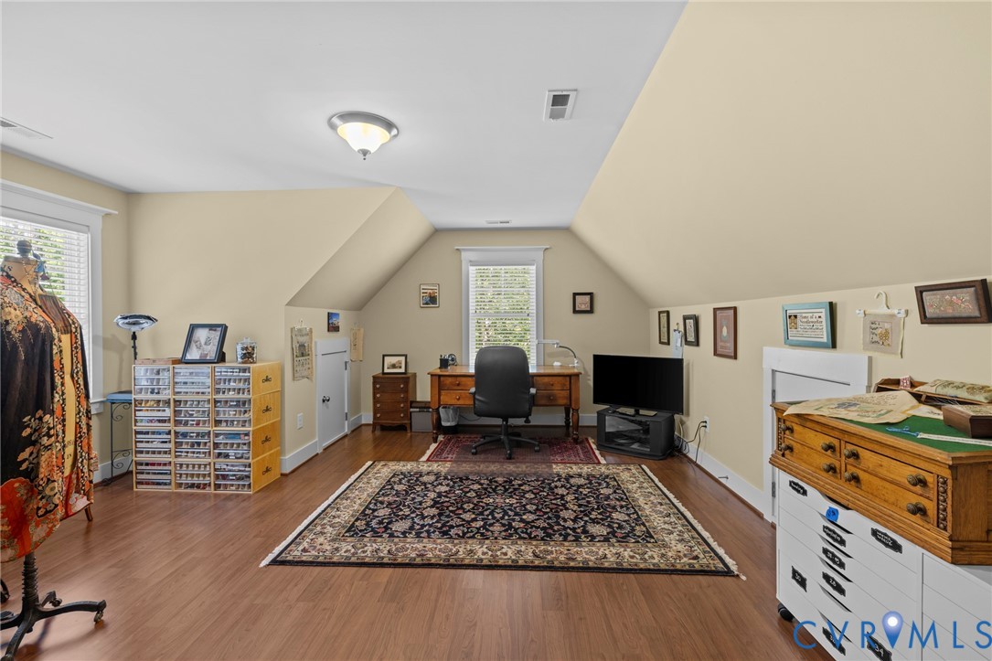 705 Wales Way Ashland, VA 23005 - Photo 34 of 62 a living room with furniture and a wooden floor