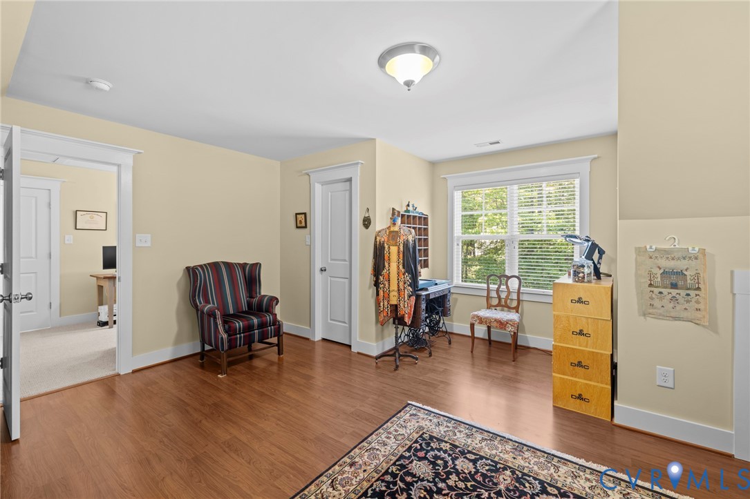 705 Wales Way Ashland, VA 23005 - Photo 35 of 62 a view of a livingroom with workspace and a couch