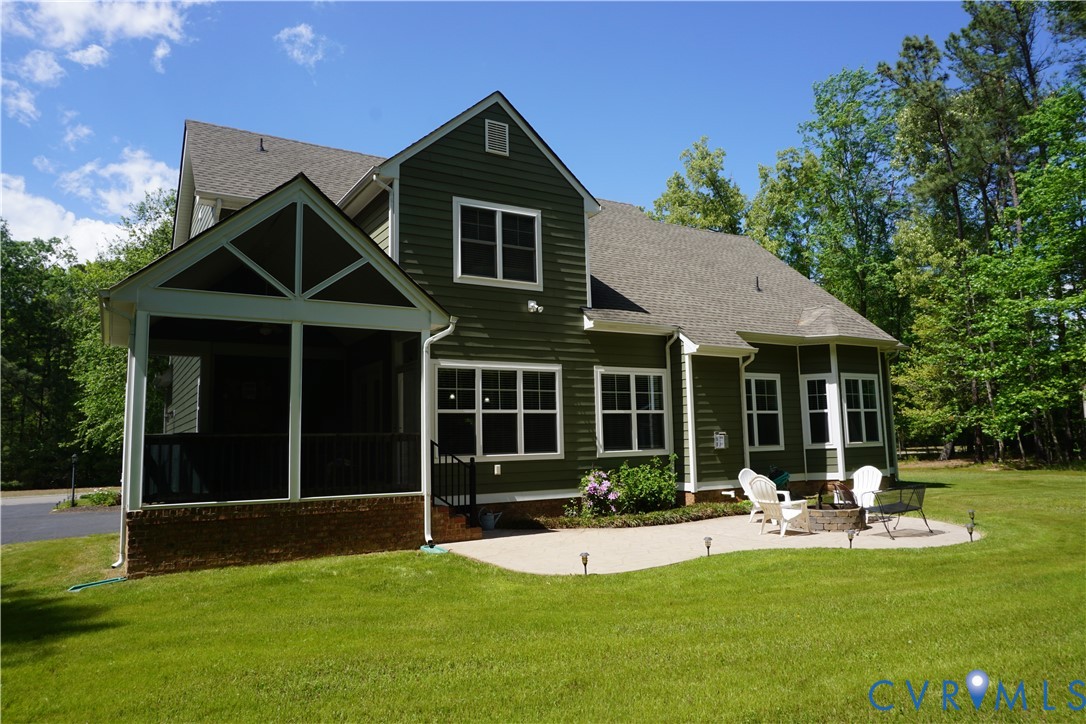 705 Wales Way Ashland, VA 23005 - Photo 49 of 62 a front view of a house with yard patio and green space