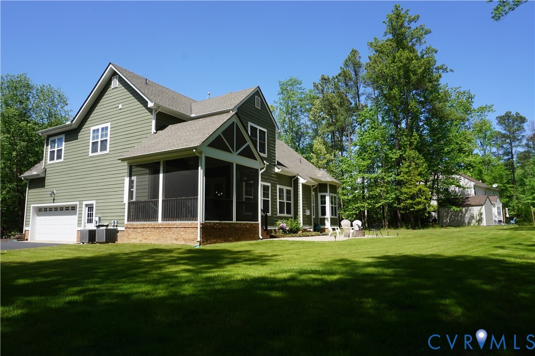 705 Wales Way Ashland, VA 23005 - Photo 50 of 62 a front view of a house with a yard