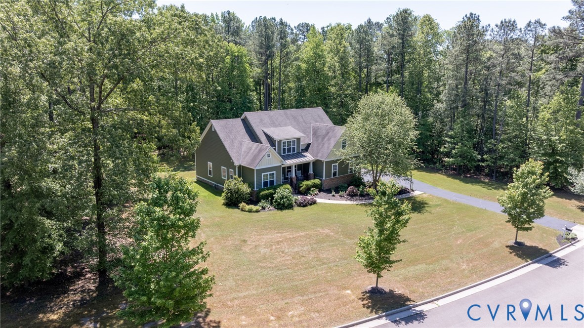 705 Wales Way Ashland, VA 23005 - Photo 51 of 62 a view of a house with pool and sitting area