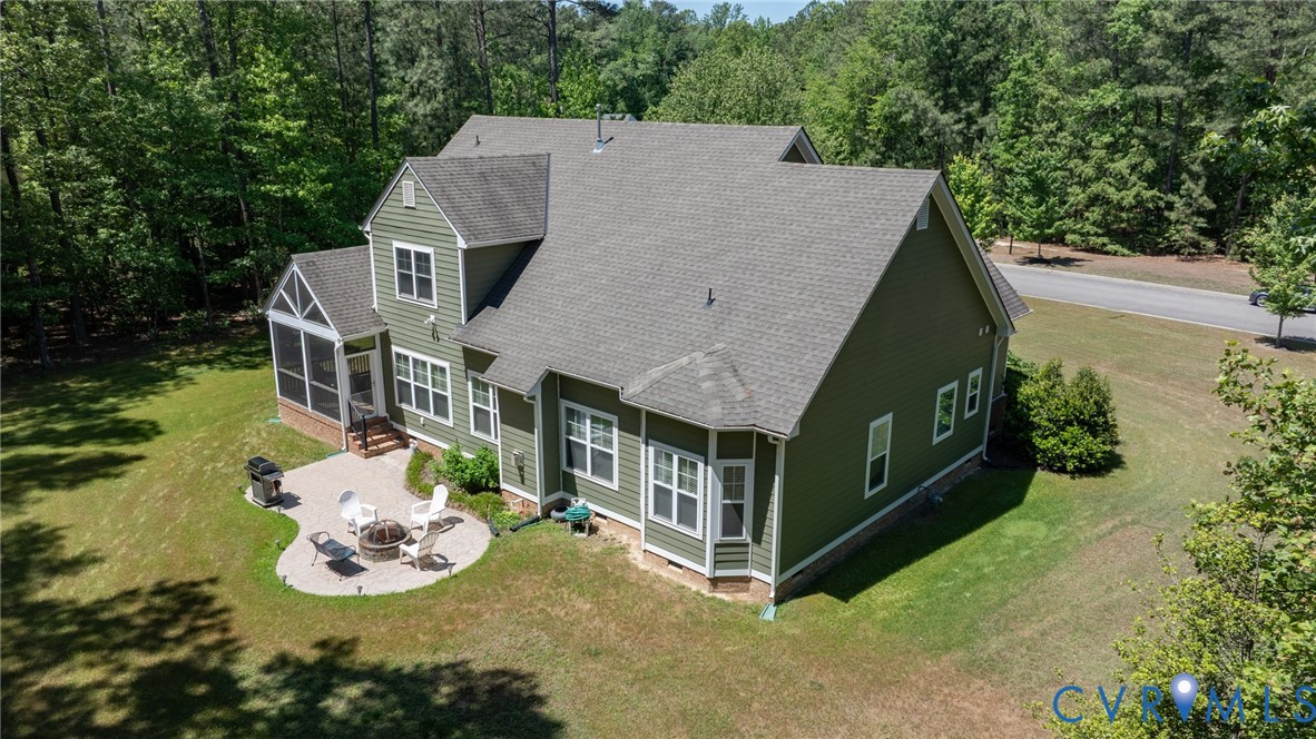 705 Wales Way Ashland, VA 23005 - Photo 55 of 62 a aerial view of a house with table and chairs in a patio