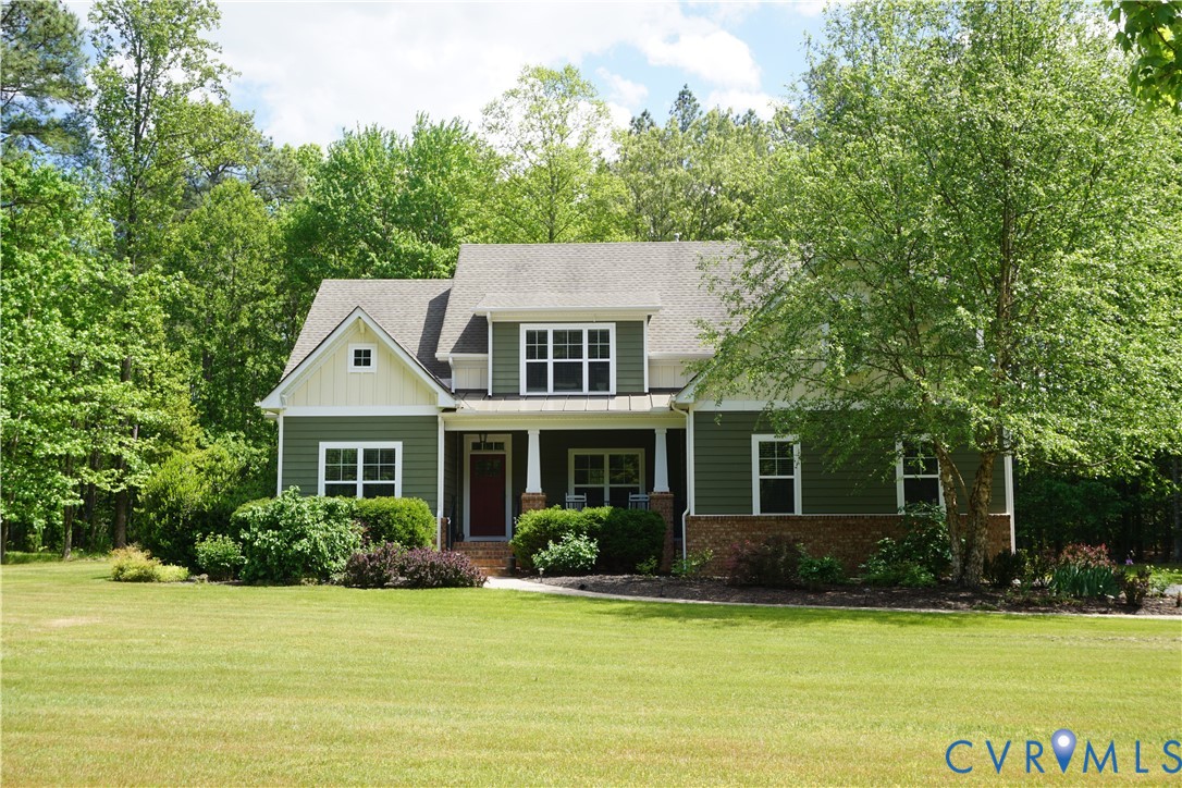 705 Wales Way Ashland, VA 23005 - Photo 61 of 62 a front view of a house with a garden