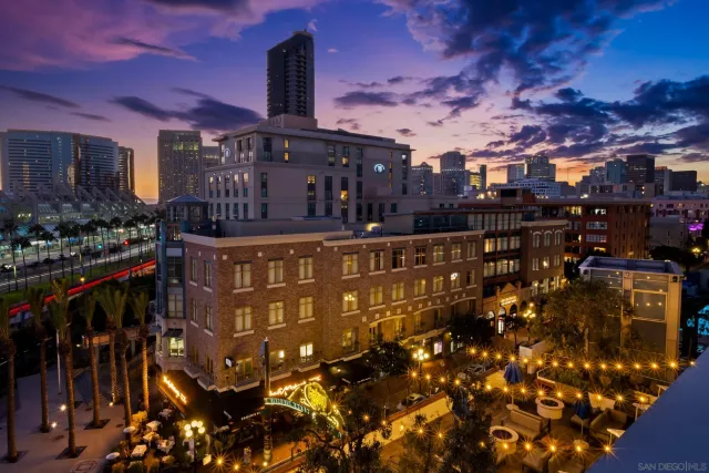 a view of street with parked cars