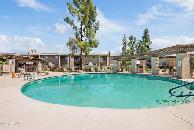 a view of a house with a swimming pool