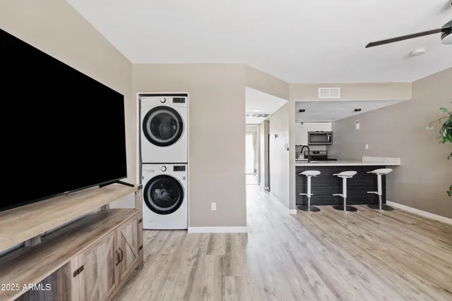 a view of kitchen and oven with wooden floor