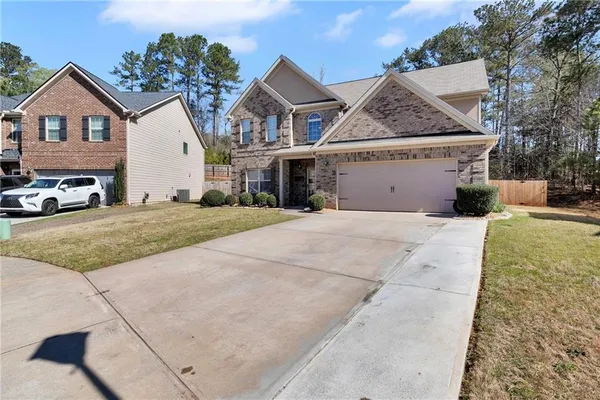 front view of a house with a patio