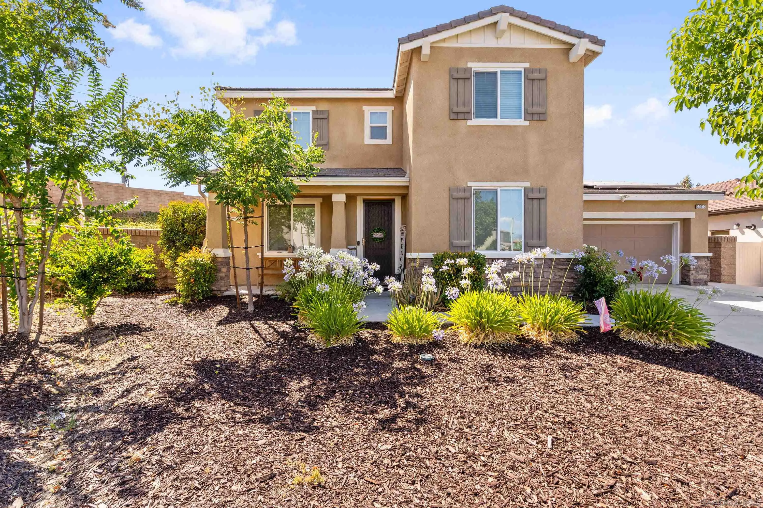 a view of house with outdoor space