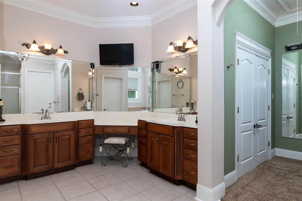 9496 Mayfield Road South Collierville, TN 38017 - Photo 11 of 25 a spacious bathroom with a double vanity sink mirror and bathtub