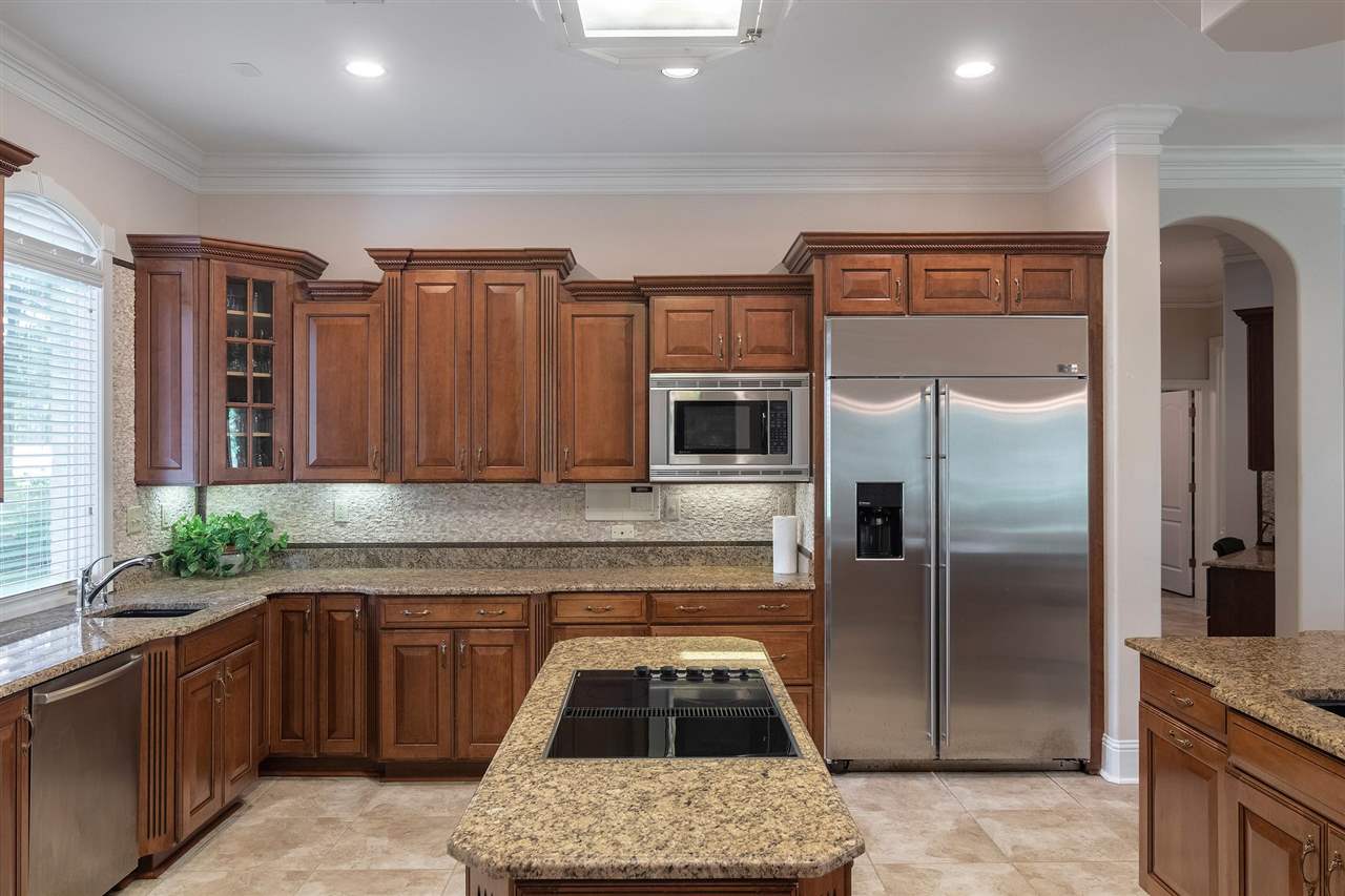 9496 Mayfield Road South Collierville, TN 38017 - Photo 14 of 25 a kitchen with stainless steel appliances granite countertop a refrigerator and a sink