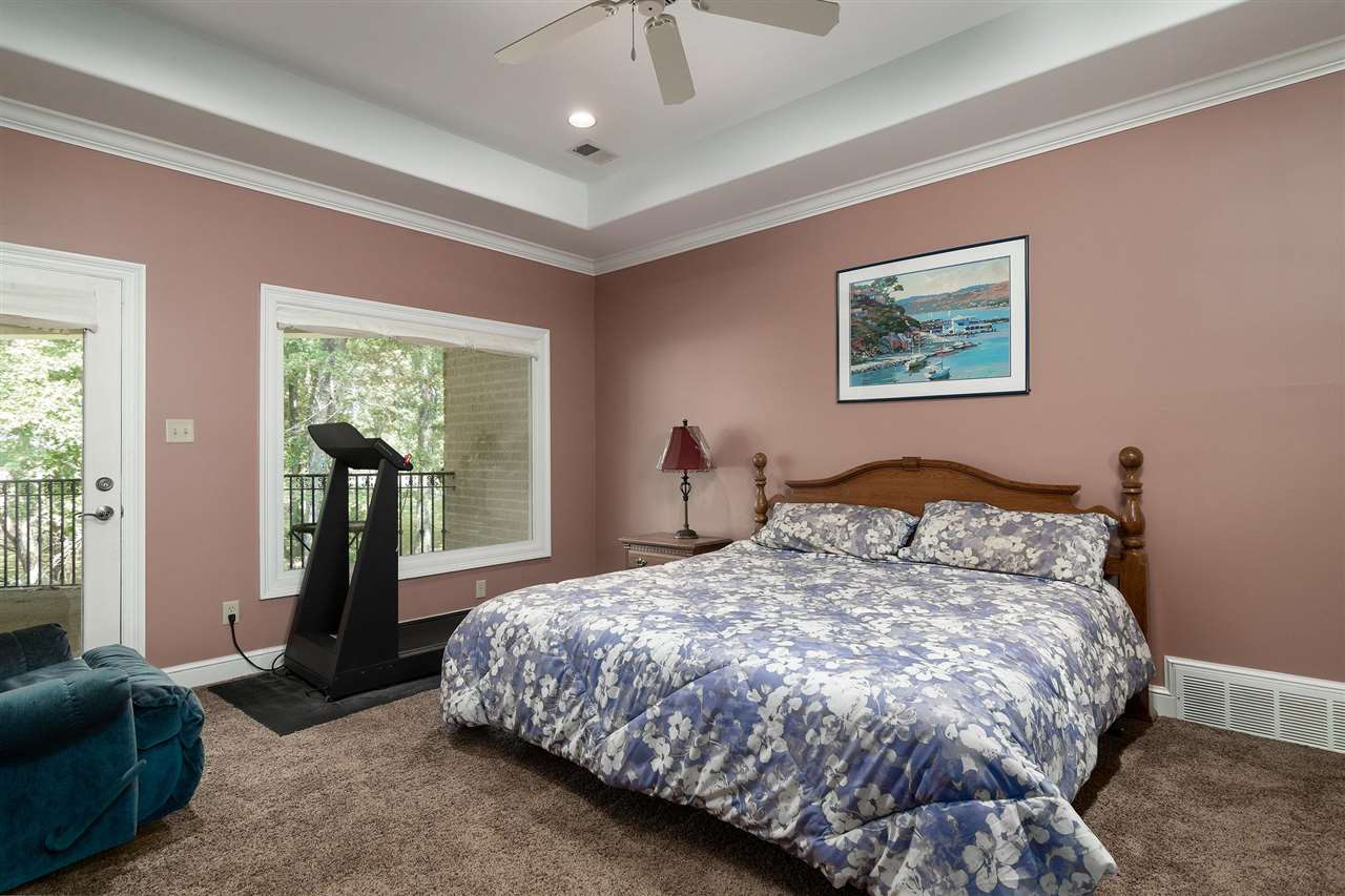 9496 Mayfield Road South Collierville, TN 38017 - Photo 24 of 25 a bedroom with a large bed and a large window