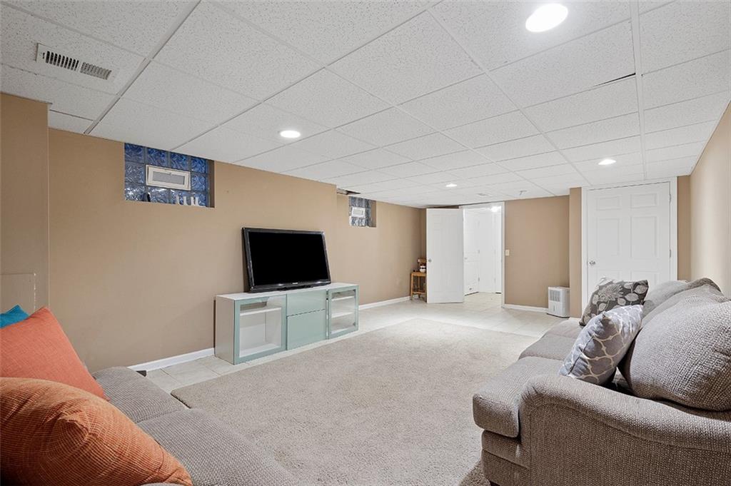 330 Johnston Road Pittsburgh, PA 15241 - Photo 22 of 25 Finished room in lower level to make into whatever your heart desires! Game room, movie room, man cave, the options are endless!!!!