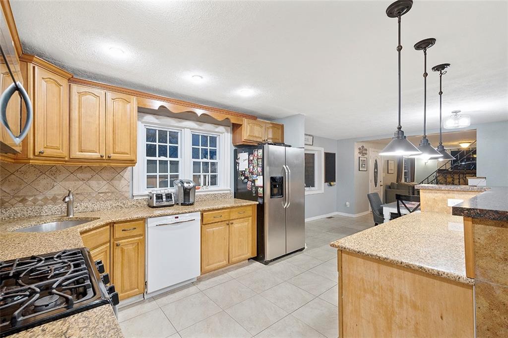 330 Johnston Road Pittsburgh, PA 15241 - Photo 6 of 25 Another view of the kitchen looking into the dining room which are connected, that make it a great space for entertaining!!!
