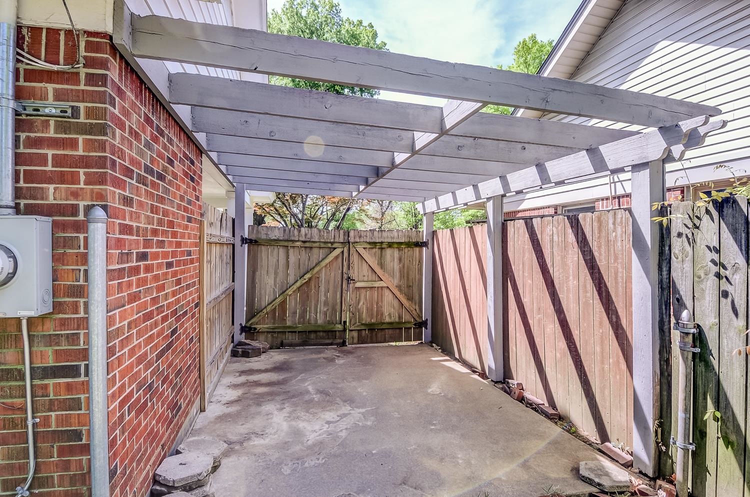 5056 Wingdale Road Memphis, TN 38117 - Photo 5 of 18 View of patio with a pergola and a gate