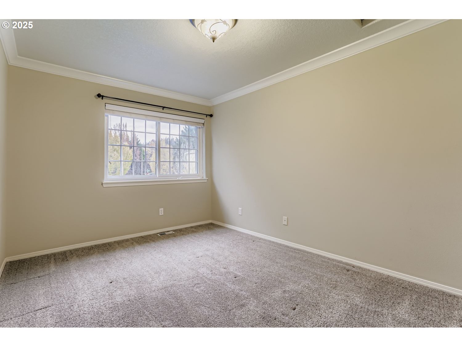 12697 Southwest Canvasback Way Beaverton, OR 97007 - Photo 27 of 41 an empty room with wooden floor and windows