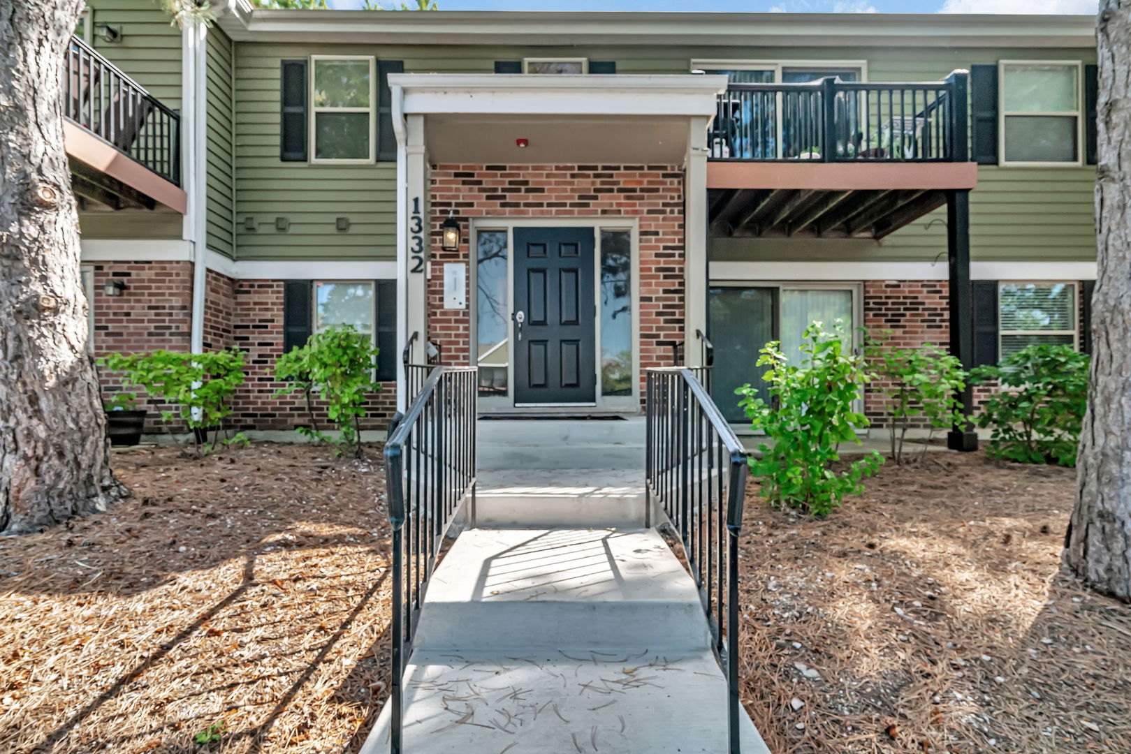 1332 McDowell Road, Unit 104 Naperville, IL 60563 - Photo 1 of 19 a view of entrance of the house