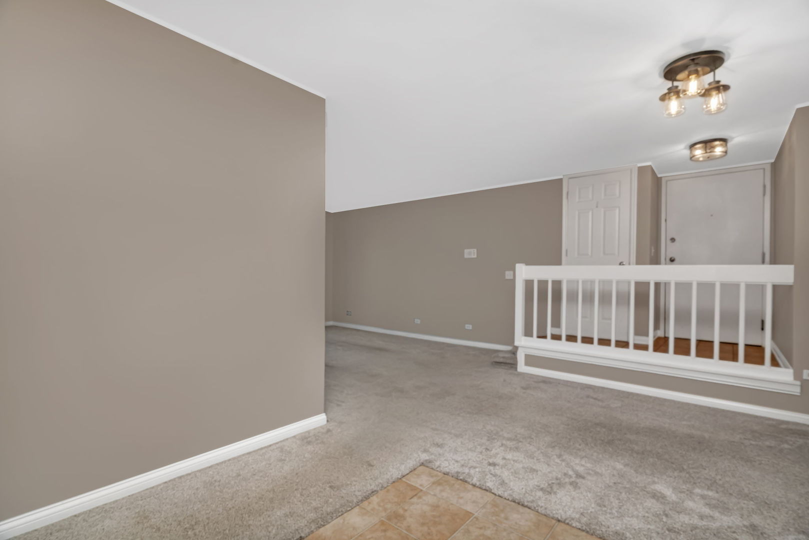 1332 McDowell Road, Unit 104 Naperville, IL 60563 - Photo 11 of 19 a view of an entryway with stairs