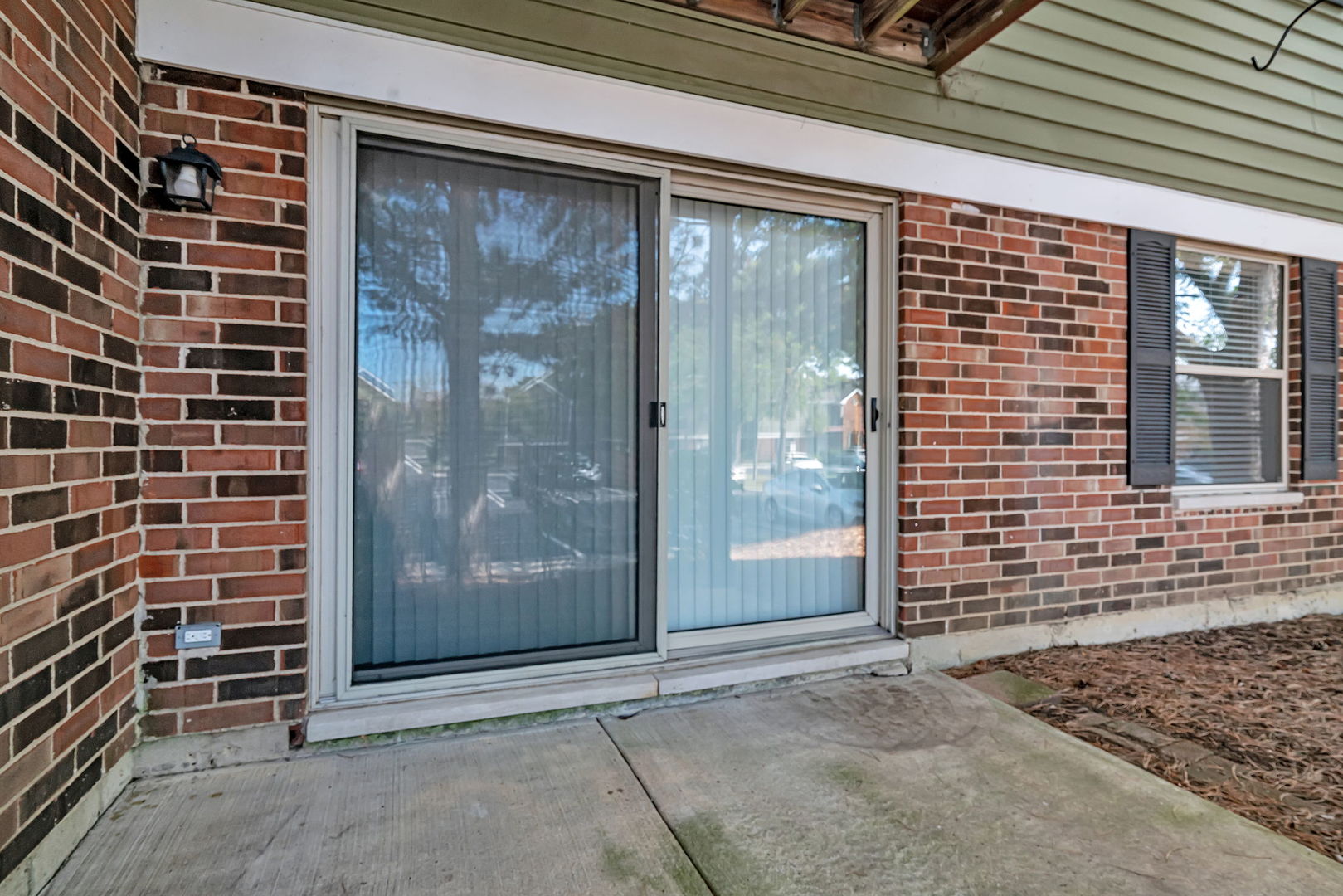 1332 McDowell Road, Unit 104 Naperville, IL 60563 - Photo 3 of 19 a view of a door and a window