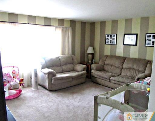 81 Princeton Road Old Bridge, NJ 08859 - Photo 3 of 15 a living room with furniture and a window