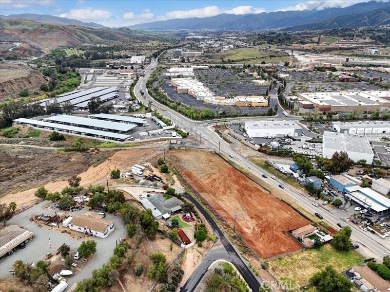 19980 Temescal Canyon Road Corona, CA 92881 - Photo 13 of 24 an aerial view of residential houses with outdoor space