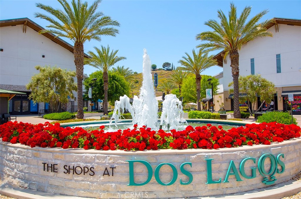 19980 Temescal Canyon Road Corona, CA 92881 - Photo 20 of 24 a front view of multi story residential apartment building with entryway