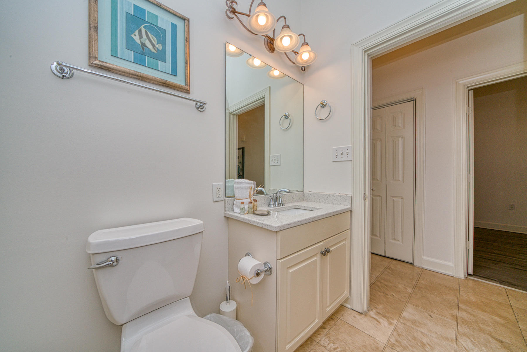 10343 East County Highway 30A, Unit 307 Seacrest, FL 32413 - Photo 12 of 34 a bathroom with a toilet a sink and a mirror