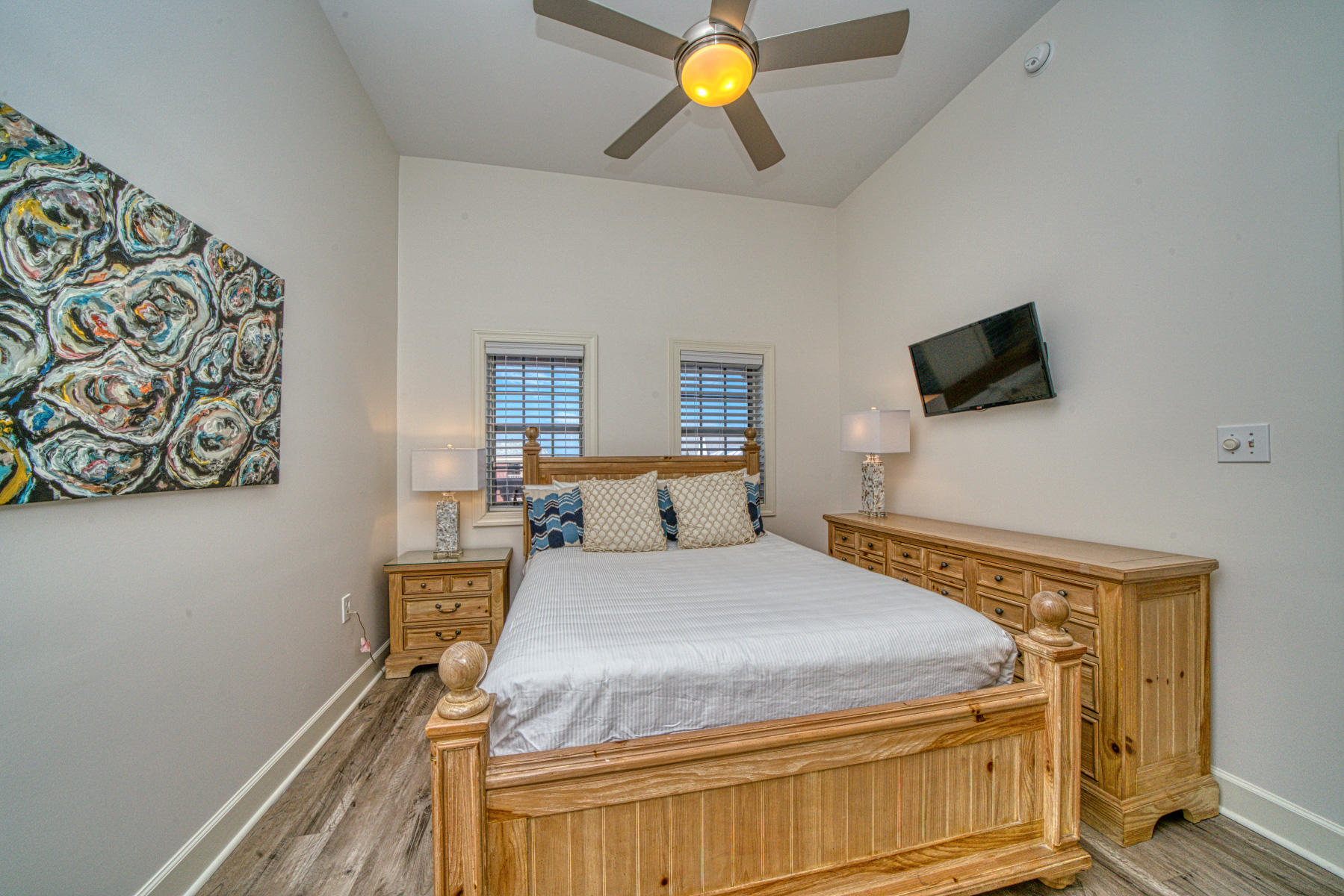 10343 East County Highway 30A, Unit 307 Seacrest, FL 32413 - Photo 15 of 34 a bedroom with a bed and a flat screen tv