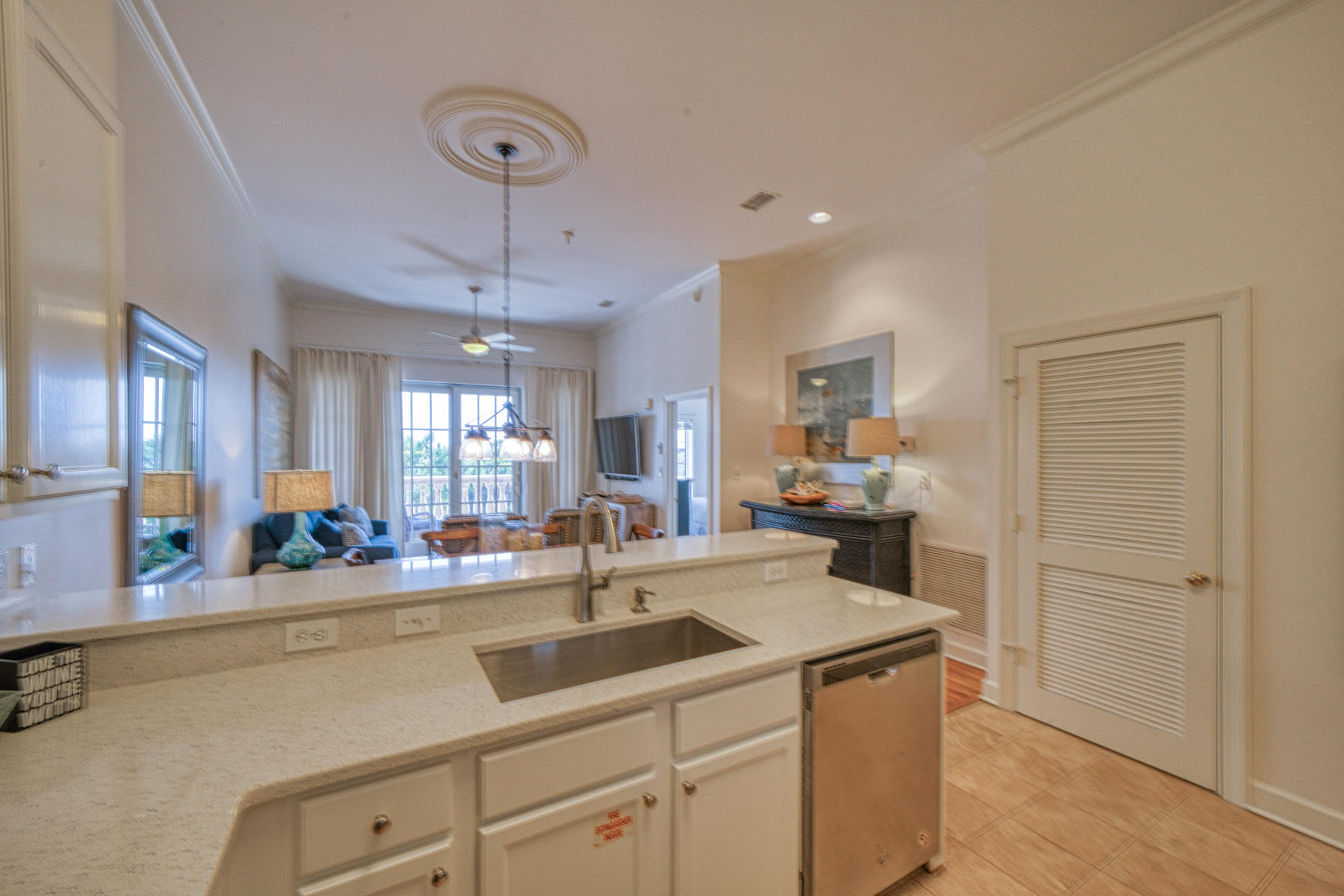 10343 East County Highway 30A, Unit 307 Seacrest, FL 32413 - Photo 24 of 34 a kitchen with a sink and cabinets