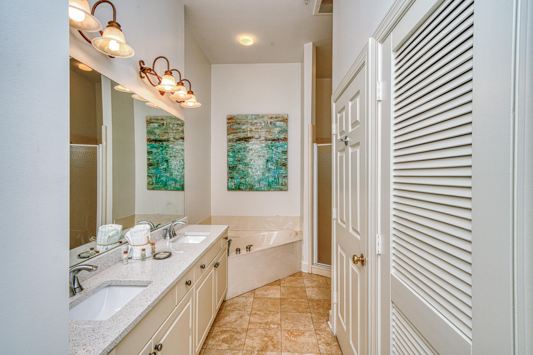10343 East County Highway 30A, Unit 307 Seacrest, FL 32413 - Photo 25 of 34 a bathroom with a double vanity sink mirror and a bathtub