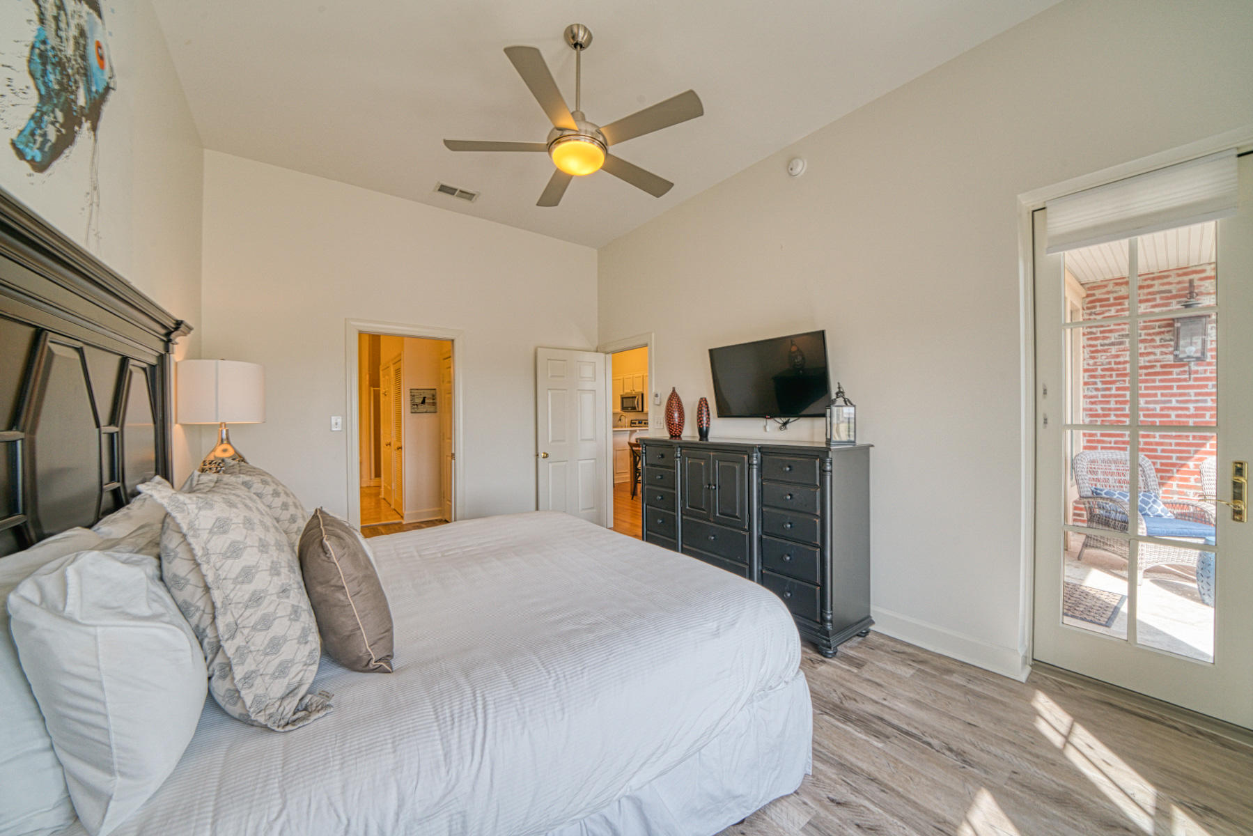 10343 East County Highway 30A, Unit 307 Seacrest, FL 32413 - Photo 26 of 34 a bedroom with a bed and a flat screen tv