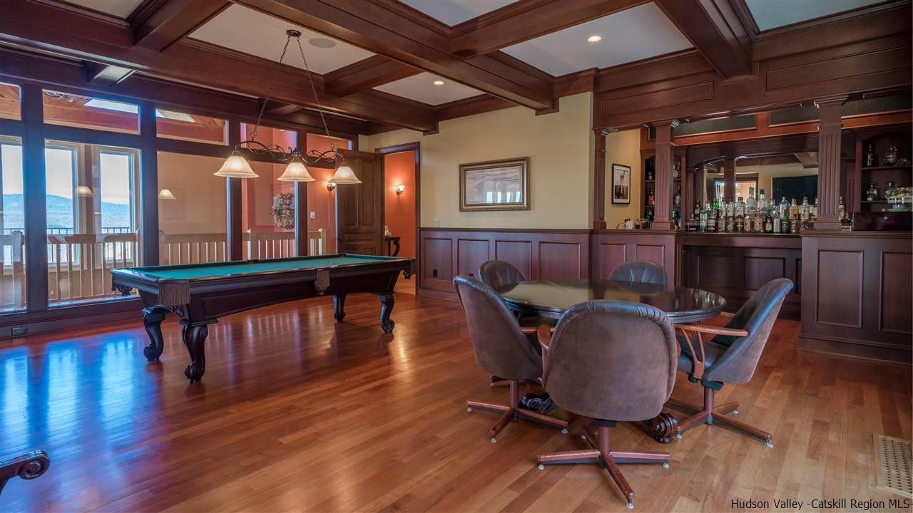 374 Kristins Ridge Road Margaretville, NY 12455 - Photo 12 of 33 a dining room with furniture window and wooden floor