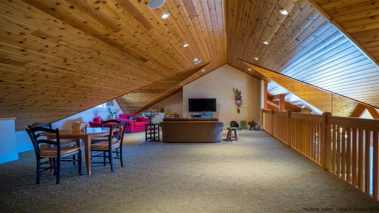 374 Kristins Ridge Road Margaretville, NY 12455 - Photo 14 of 33 a backyard of a house with table and chairs