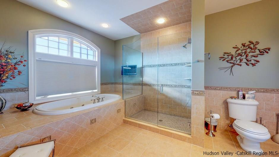 374 Kristins Ridge Road Margaretville, NY 12455 - Photo 20 of 33 a bathroom with a bathtub sink and toilet