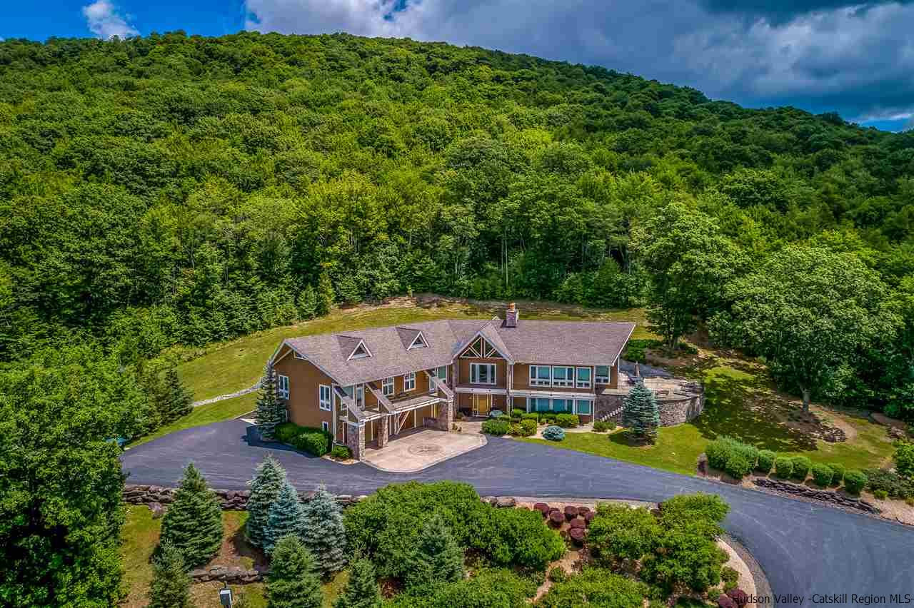 374 Kristins Ridge Road Margaretville, NY 12455 - Photo 2 of 33 an aerial view of a house with garden space and a street view