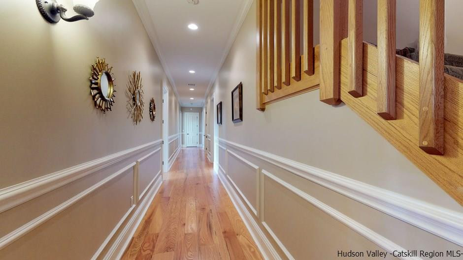 374 Kristins Ridge Road Margaretville, NY 12455 - Photo 21 of 33 a view of a hallway with wooden floor and staircase